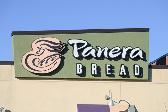 Burlington, WA, USA - February 12, 2022; Sign for a Panera Bread food and drink location with a blue sky