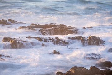 Thor's well at sunset on the Oregon coast with wave