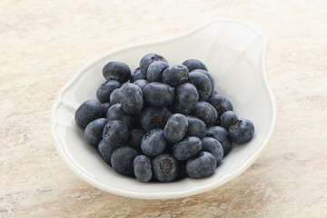 Sweet ripe blueberry heap in the bowl