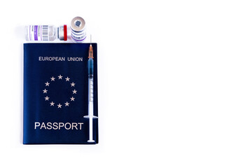 Covid passport or green travel certificate. European Union passport, vaccines and syringe. The need for vaccination for world travel and pandemic control. EU health passport concept.