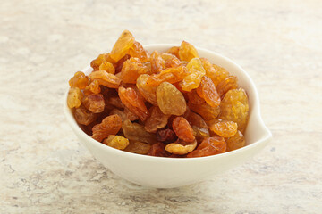 Sweet yellow raisin in the bowl