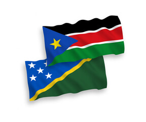 Fototapeta premium Flags of Solomon Islands and Republic of South Sudan on a white background