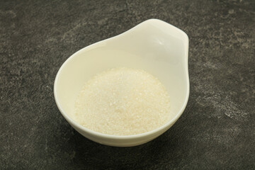 White sugar in the bowl