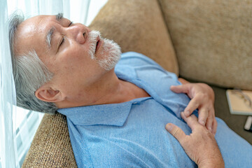 Old asian man having heart attack chest pain, Health problems medical concept.