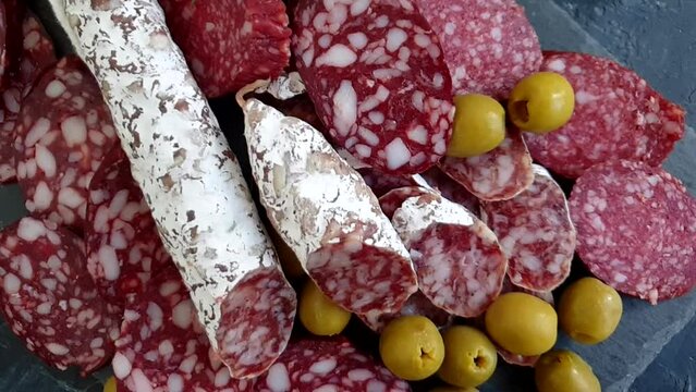 sausage with mold on old background