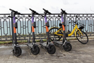 electric scooters on the sea embankment for rent