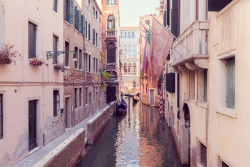 Fototapeta na wymiar narrow canal in Venice with gandola