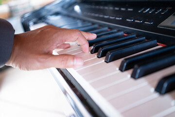 Fototapeta premium The musicians were playing the piano for the joy of life.