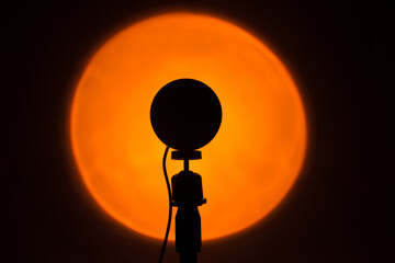Electric sunset lamp for atmospheric, warm yellow illumination at home