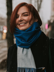 smiling girl outdoors under snow