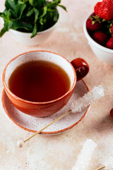 tea and sugar on a wooden stick