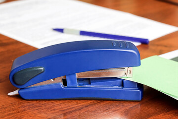 stapler on the desk staples documents