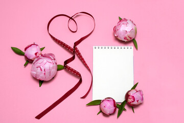 on a pink background a white leaf, beautiful pink peonies, a heart made from a red ribbon. card, congratulations on March 8, Valentine's Day, Mother's Day