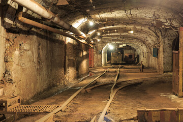 Narrow gauge railroad in the underground mine horizon. Technologies of mining of minerals by the...