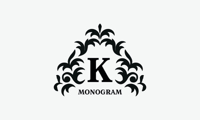 Elegant floral logo design template for letter K. Calligraphic dark elegant ornament on white background. Business sign, identity monogram for restaurant, boutique, hotel, heraldic, jewelry.