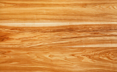 Beautiful texture of natural European walnut wood planks with a horizontal grain pattern.