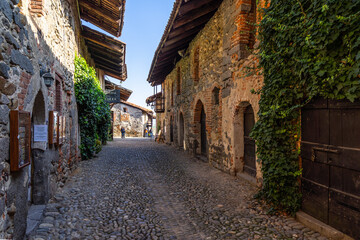 The medieval village Ricetto di Candelo is popular tourist destination in Piedmont region, Italy - obrazy, fototapety, plakaty