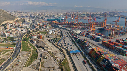 Aerial drone photo of industrial logistics unloading import and export container terminal of Perama - Piraeus, Attica, Grreece