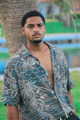 Portrait of cuban smiling and looking at camera during summer