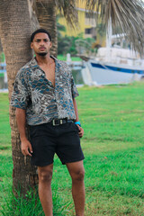 Portrait of cuban smiling and looking at camera during summer