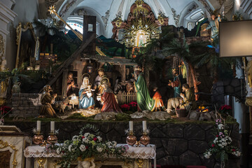 Mount St. Anna, Poland, January 22, 2022: Inside the Basilica of St. Anna in the international sanctuary of St. Anna  with elements of a Christmas nursery typical of Franciscan churches
