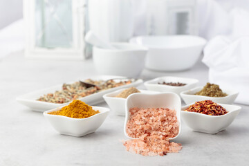 Fototapeta na wymiar Himalayan pink salt and various spices.