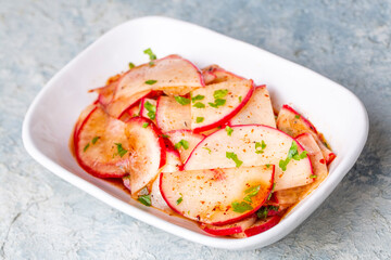 Turkish appetizers; sliced radish appetizer with sour, Turkish name; Turp mezesi