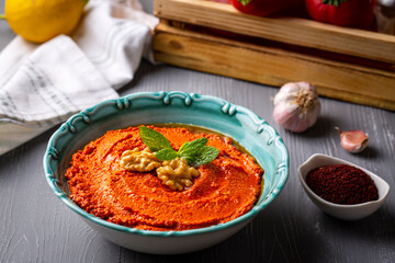 Traditional delicious Turkish appetizer, Muhammara, healthy walnut and roasted red bell pepper dip