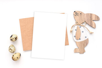 Greeting card easter mockup with wood bunny and easter eggs on white background