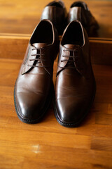 Close-up view of the brown men's shoes for a business meeting.
