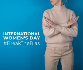 Break the bias symbol of woman's international day. Crossed hands. Woman arms crossed to show...