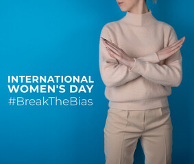 Break the bias symbol of woman's international day. Crossed hands. Woman arms crossed to show...