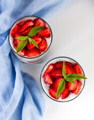 Dessert with fresh strawberry, yogurt and chia seeds. Delicious and healthy breakfast. ?lose-up. Top view.