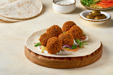 Chickpeas falafel prepare to make wrap sandwich. Closeup