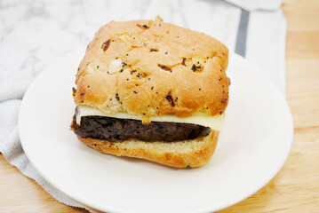 Delicious Meatloaf Sandwich with Cheese, on an Onion Roll	