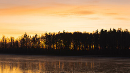 sunset on a frozen lake
