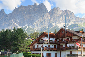 Fototapeta na wymiar Mountain panorama view with houses in Cortina d'Ampezzo, Italy