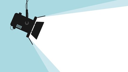 Spotlight black silhouette isolated on blue background. Lamp light projector glowing with scattered rays. Projecting a beam of light with place for text. Cinema background. Template for festive poster