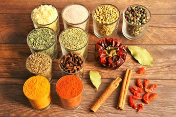 Spices on wooden background photo top view 