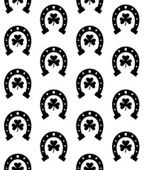 Vector seamless pattern of flat horse shoe with trefoil silhouette isolated on white background