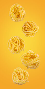 Five levitation food pastas isolated on yellow