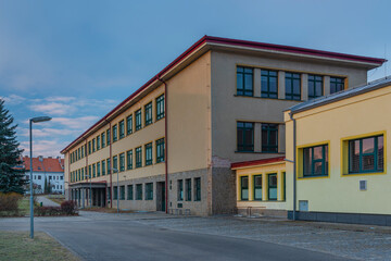 Fototapeta na wymiar School in Telc old historical town in winter sunny morning