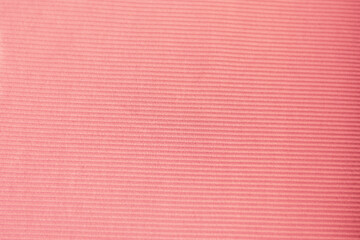background or texture of pink fabric with striped pattern on its fabric