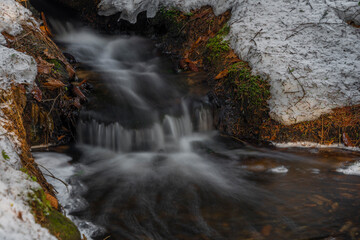 Creeks near Javorice hill in winter snowy forest