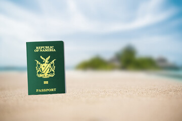 Namibian passport on the sand of the beach ,Namibian passports are issued to citizens of Namibia to travel internationally