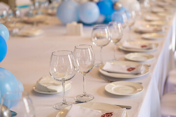 Beautiful table setting for a wedding celebration in a restaurant.
