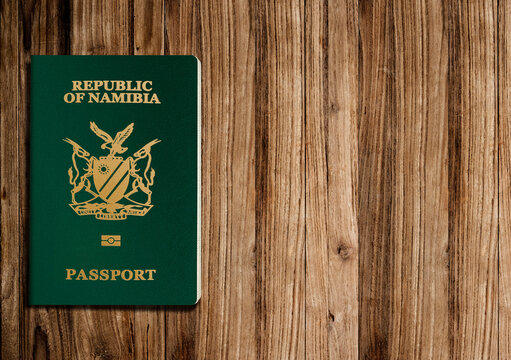 Namibian passport on wooden background ,Namibian passports are issued to citizens of Namibia to travel internationally
