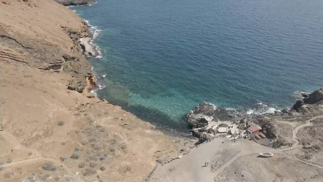 Dron shot Espania Spain Tenerife open shot sun afternoon sky buildings smog water lake paning left moutan sea covid trees tree front green blue back cars rush hour road covid empty sun sunset vol.2.mp