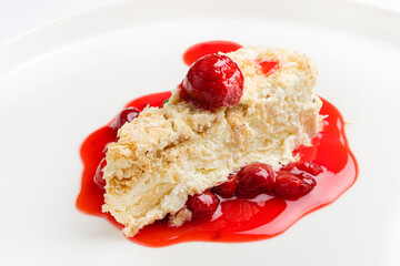 napoleon cake with cherry sauce and mint