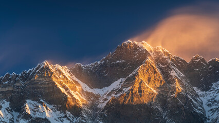 golfer light and wind on peak Lhotse in Nepal in panoramic view